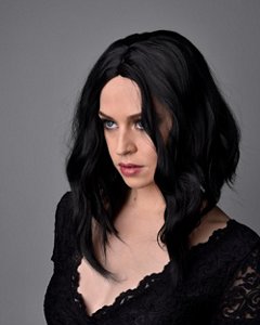 Woman dressed as a vampire with mid-length black hair